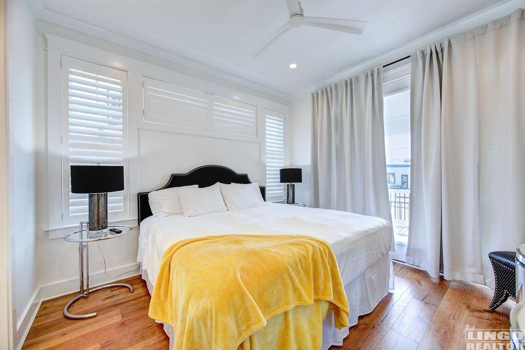 77+lake+bedroom+with+yellow+blanket 77 LAKE AVENUE Rental Property 77+lake+bedroom+with+yellow+blanket 77 LAKE AVENUE Rental Property