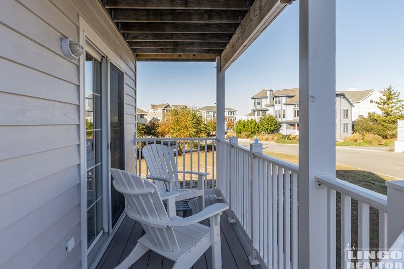 ecapeshore511-72frontporch 511 E Cape Shores Drive Rental Property ecapeshore511-72frontporch 511 E Cape Shores Drive Rental Property