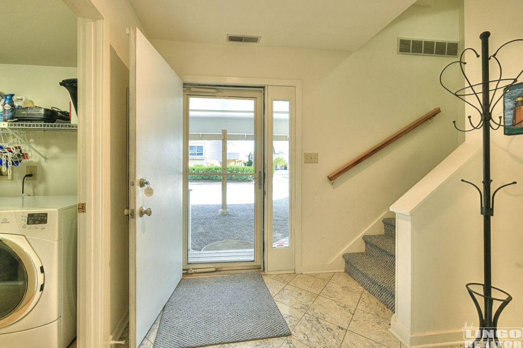 52+Port+Lewes+Foyer+1 53 Cape Henlopen Drive #52 Rental Property